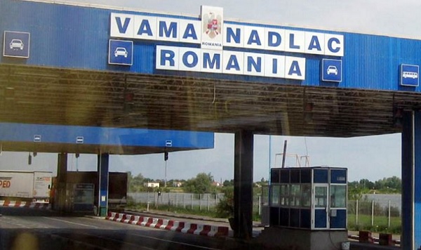 56 de cetăţeni străini au încercat să iasă din România ascunși printre paleţi cu vin şi pervazuri